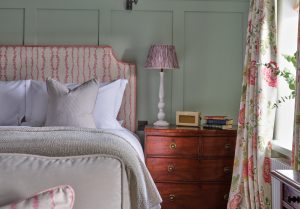 Stanwell House Cosy room with floral bedroom